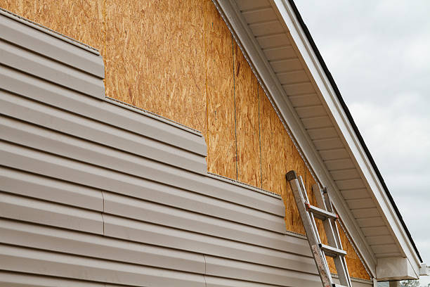Professional Siding technician working in West Grove, PA